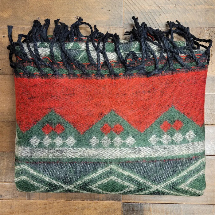 A 100% acrylic handwoven blanket with bold red and green geometric pattern and black fringe for summer evenings use