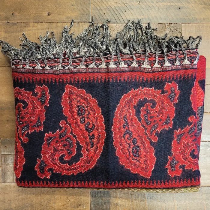 A navy blue and red 100% acrylic shawl with bold paisley patterns and fringed edges for summer evenings