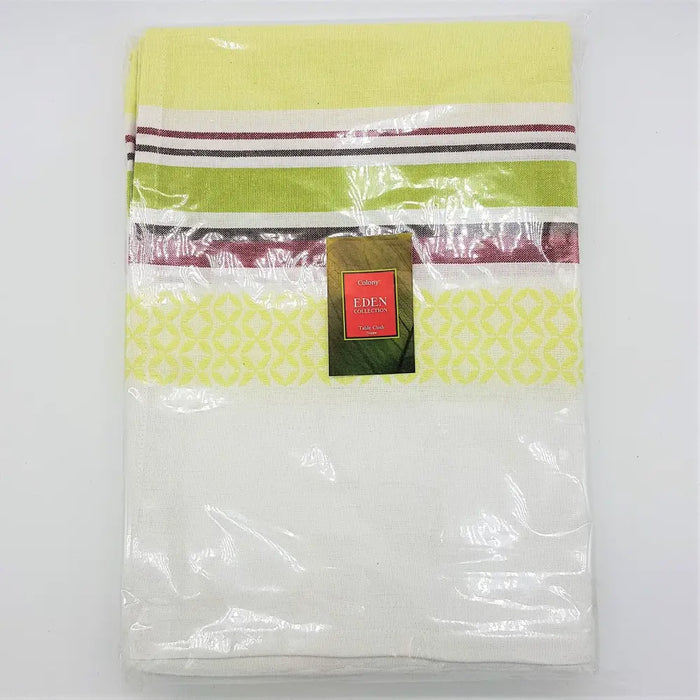 Folded lime green and white striped cotton outdoor tablecloth with geometric pattern in clear plastic packaging from eden collection