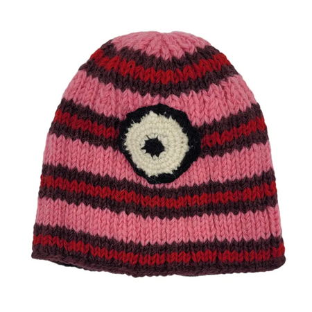 A knitted pink minion beanie hat with fleece lining made from zealand wool featuring a white eye patch design