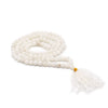 White quartz bead mala necklace with 108 smooth round beads gold accent and white tassel shown with velvet pouch