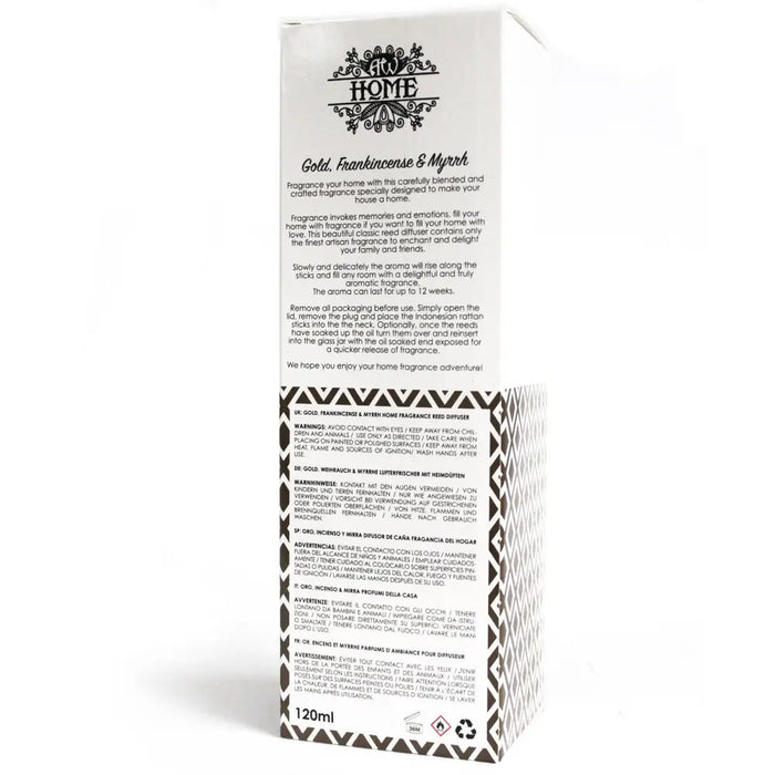 White cardboard box with black logo and 120ml gold frankincense and myrrh reed diffuser glass bottle inside