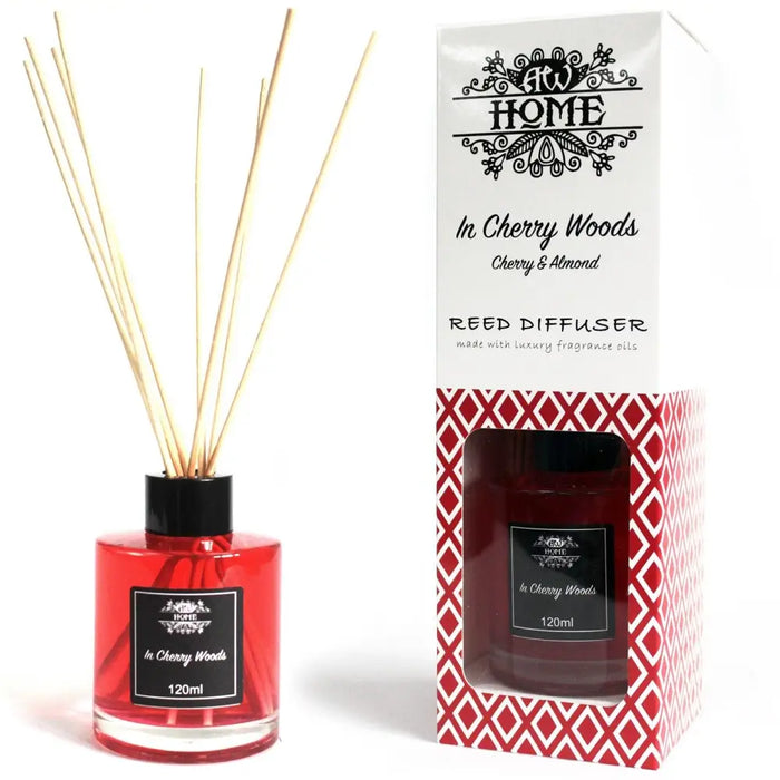 Red glass reed diffuser with black cap and label in cherry woods scent in a 120ml glass bottle