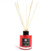 Red glass bottle reed diffuser with black cap and beige reeds in cherry woods scent and 120ml size