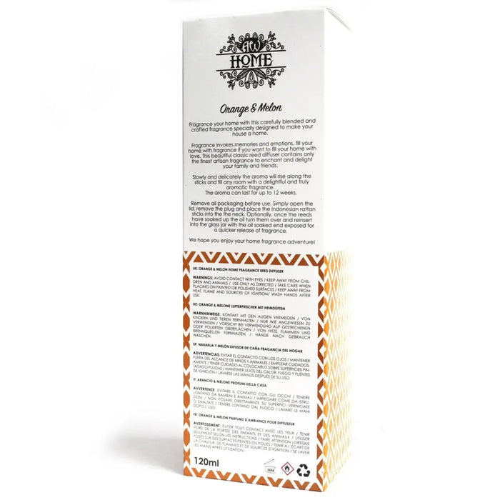 White and orange patterned cardboard box for 120ml reed diffuser with orange melon oil that lasts in a glass bottle