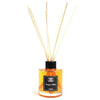 A glass bottle reed diffuser with amber oil and wooden reeds labeled orange and melon 120ml with oil that lasts