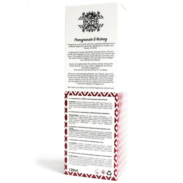 White cardboard box with red and white diamond pattern featuring home logo and 120ml pomegranate nutmeg reed diffuser glass bottle