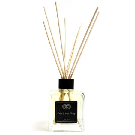 Clear glass 200ml basil and maychang reed diffuser with black cap pale yellow eco-mineral oil base and wooden reeds