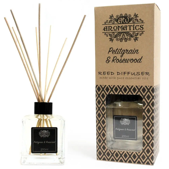 Clear glass 200ml petitgrain and rosewood essential oil reed diffuser with black cap and natural rattan sticks inside