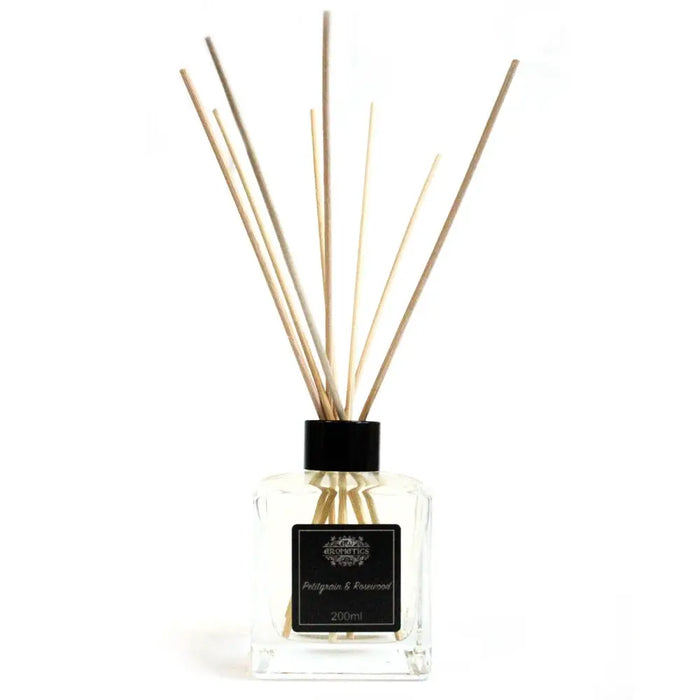 Clear glass 200ml petitgrain and rosewood essential oil reed diffuser with black cap and light wooden rattan sticks