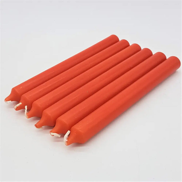 Six vibrant orange 21cm non-drip bistro dinner candles with smooth bodies and white wicks sold individually
