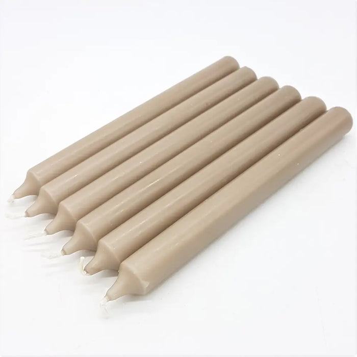 Six beige 21cm non-drip bistro taper candles with smooth cylindrical bodies and pointed tips sold individually