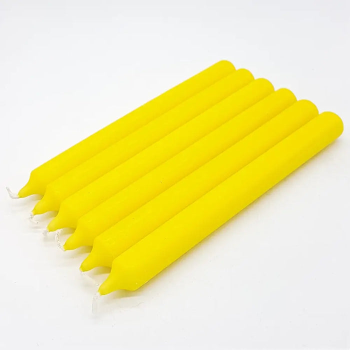 Six vibrant yellow 21cm non-drip bistro dinner candles with smooth tapered bodies sold individually