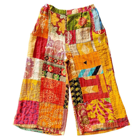 3/4 length wide leg kantha trousers with vibrant patchwork and floral patterns featuring a green waistband