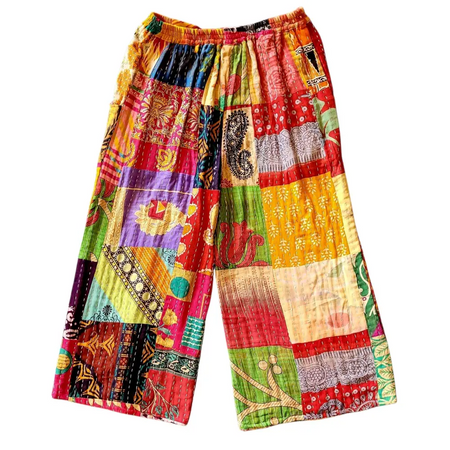 Vibrant kantha trousers with wide leg silhouette featuring patchwork cotton and a pink waistband in red yellow green hues