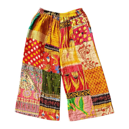 Vibrant patchwork kantha trousers with wide leg and turquoise waistband in red yellow green and pink fabrics with embroidery