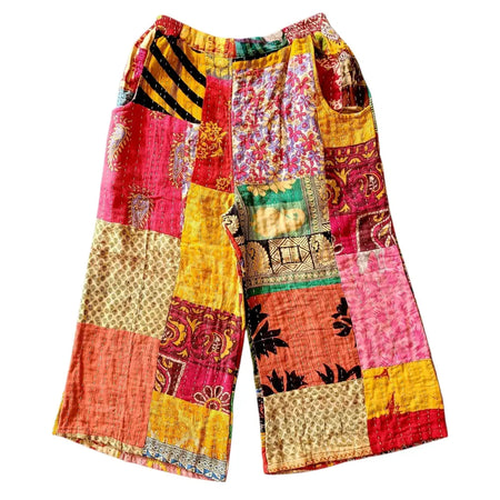 Vibrant patchwork kantha trousers with wide leg and turquoise waistband in red yellow pink and orange quilted design