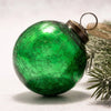 3 inch large emerald crackle glass christmas bauble with vibrant green textured surface and brass metal cap