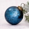 A deep blue 3 inch old navy crackle glass bauble with crackle effect and brass cap for christmas decoration