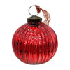Vibrant red glass ball decoration with vertical ribbed texture and metallic cap for holiday decor