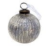 A 3 inch silver glass ribbed ball decoration with vertical ridges, brass top, and white ribbon hanging loop