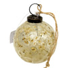 Clear glass 3 inch spray botanical bauble with dried golden flowers and dark metal cap hanging by natural twine