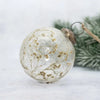 Clear glass 3 inch spray botanical bauble with dried baby’s breath inside brass cap and twine hanger