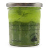 A vibrant green classic mojito sugar body scrub with shea butter in a clear glass jar and silver lid with lime logo