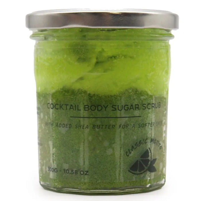 A vibrant green classic mojito sugar body scrub with shea butter in a clear glass jar and silver lid with lime logo
