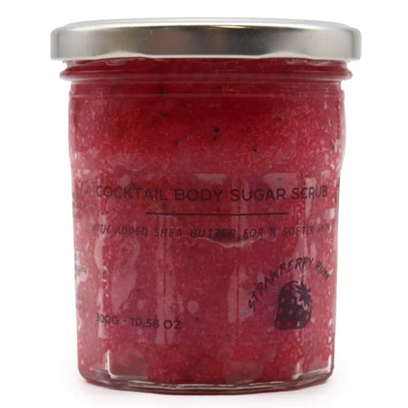 A vibrant red strawberry rum fragranced sugar body scrub in a clear glass jar with silver lid for dry skin care
