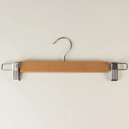 Light brown wooden clip hanger with silver metal clips and curved hook clip hangers 33cm for clothes hanging