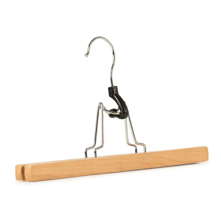 Light-colored wooden grip bar hanger with silver metal hook and black plastic clip for hanging clothes