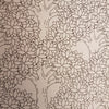 A beige page from adult colouring book peaceful patterns by charlie wood-penn with black line drawings of stylized trees