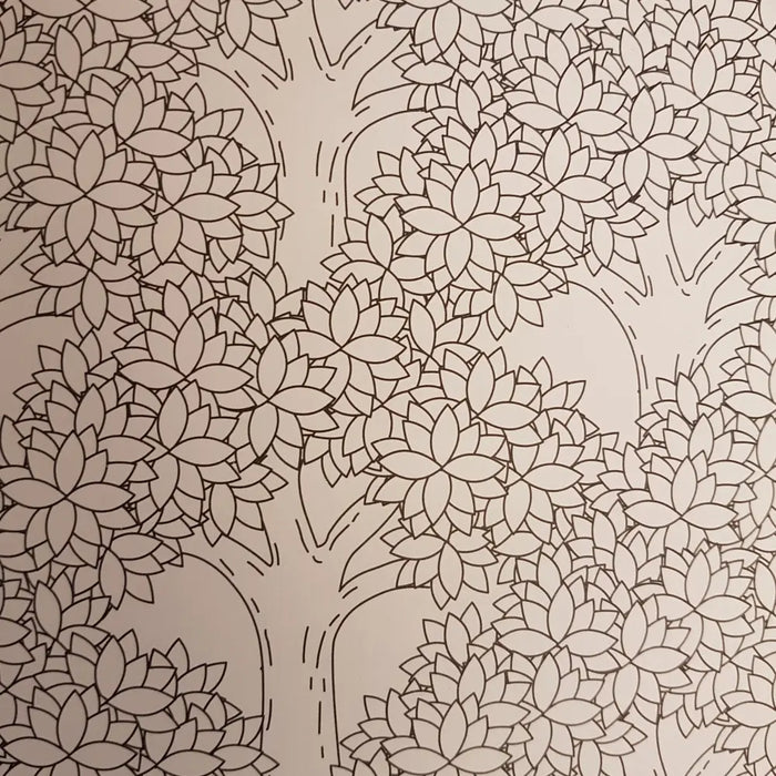 A beige page from adult colouring book peaceful patterns by charlie wood-penn with black line drawings of stylized trees