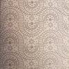 Beige adult colouring book page with intricate black line art of circular and fan-shaped geometric patterns by charlie wood-penn