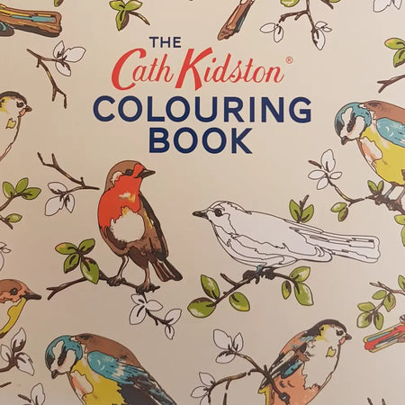 The cath kidston colouring book features a charming bird and blossom pattern on its softcover for adults