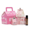 Pink house-shaped gift box with white floral and bird patterns in agnes & cat wellness gift set for cat wellness