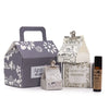 Gray house-shaped gift box with white floral and bird patterns and handle for agnes & cat wellness gift lake breeze