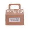 A taupe cat wellness gift box with white floral pattern and handle labeled agnes and cat wellness gift set moroccan morning