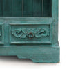 Teal distressed albasia bathroom cabinet with carved floral drawer front and brass ring pull in turquoise wash finish