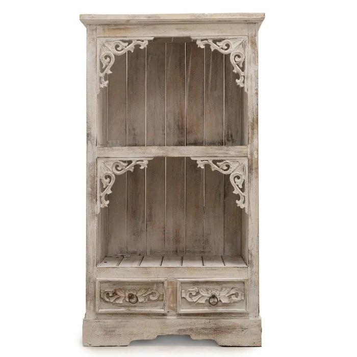 A rustic whitewashed albasia bathroom cabinet with carved corner brackets and floral carved drawers