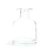 Clear glass apothecary style reed diffuser bottle with short neck rounded shoulders and finish bottle stopper