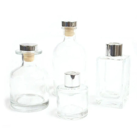 Clear glass apothecary style reed diffuser bottles with silver finish bottle stoppers and corks for bamboo reed diffuser use