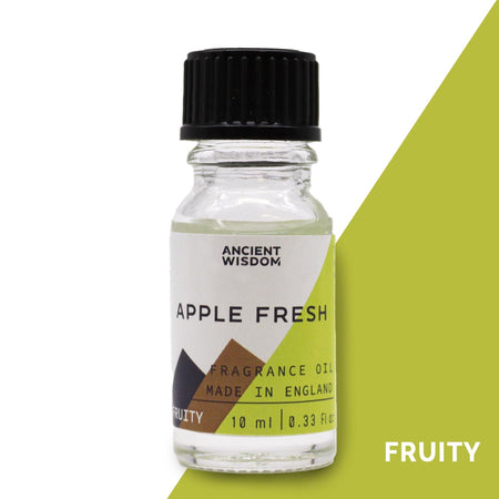 A clear glass bottle of apple fresh fragrance oil with black ribbed cap and geometric label showing allergen declarations