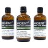 Three amber glass bottles with black caps labeled ancient containing 100ml apricot kernel organic base oil and allergen declarations