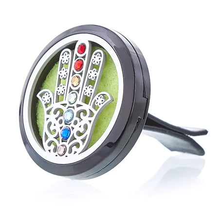 Black car air freshener with silver stainless steel hamsa hand design and colorful gemstones in aromatherapy diffuser kit