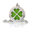 Silver circular aromatherapy diffuser necklace with green four-leaf clover design and 30mm pendant size