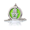 Silver circular aromatherapy diffuser necklace with hand-shaped cutout green felt and black stitched detailing