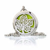 Silver aromatherapy diffuser necklace with 30mm circular locket, leaf cutout, green inner panel, and beaded chain