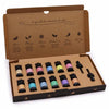 A colorful aromatherapy essential oil set with ten labeled bottles in a brown cardboard box with black caps